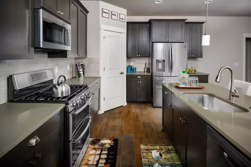 The gorgeous bright kitchen has all upgraded finishes and is a wonderful and open space to entertain and connect with everyone.