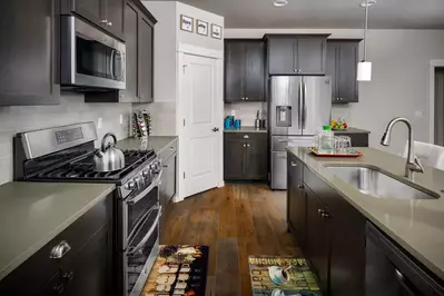 The gorgeous bright kitchen has all upgraded finishes and is a wonderful and open space to entertain and connect with everyone.