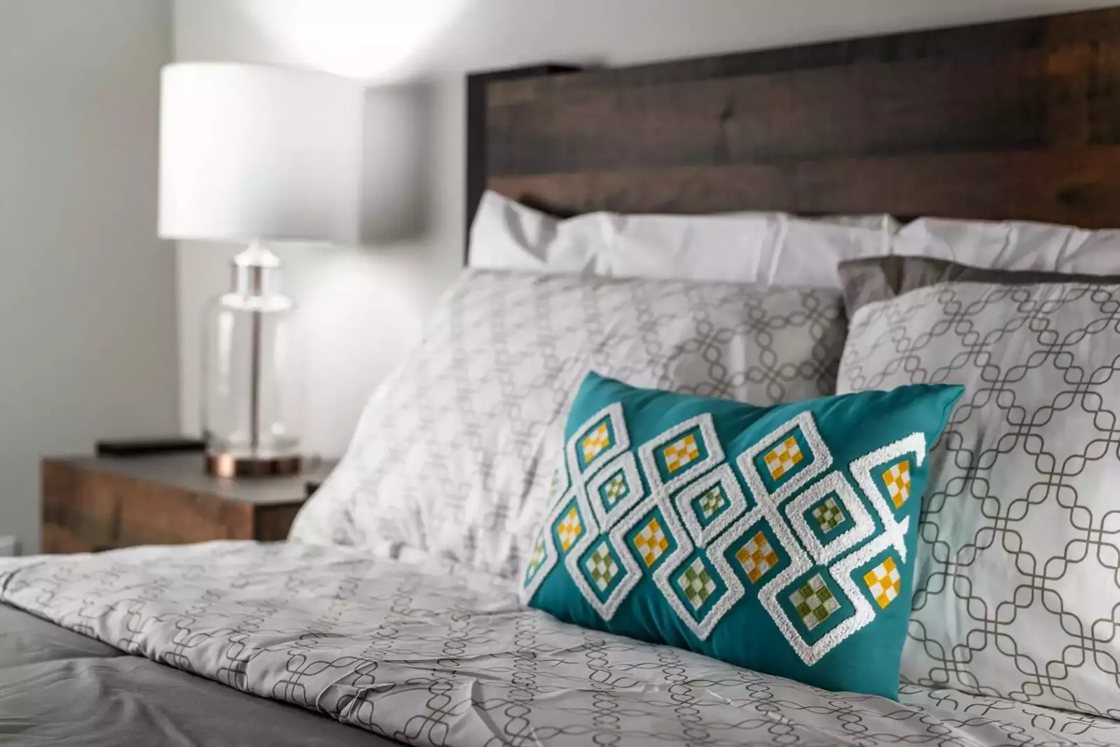 Main level bedroom with freshly washed linens