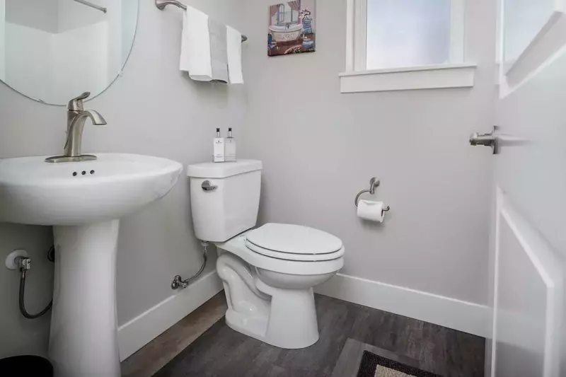 First floor bathroom includes a combo shower and tub.