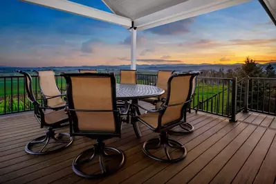 Spectacular views from the nearly wrap-around deck. -Sheri