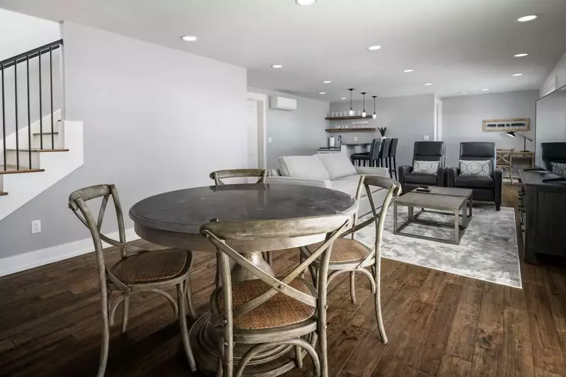 Downstairs has two more bedrooms, a fold out sofa bed and a wet bar.