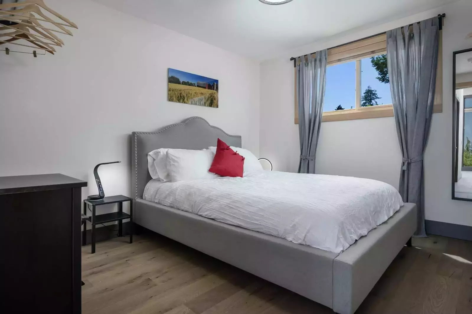 One of four bedrooms with queen beds all with independent heating and a/c.