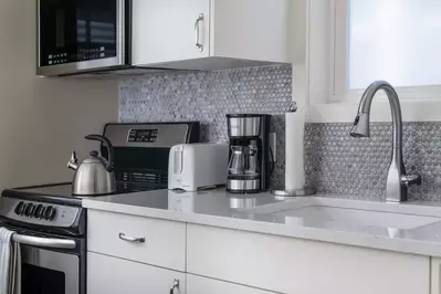 Cook delicious meals for breakfast, lunch, and dinner in this fully equipped kitchen.