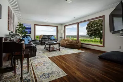 The oversized windows allow for amazing vineyard views all around.