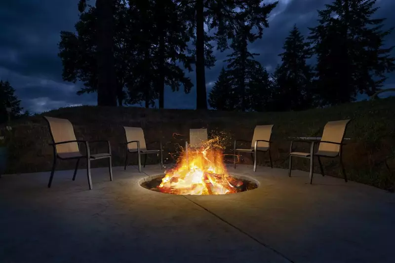 Enjoy the fire-pit on this oversized patio during your stay.