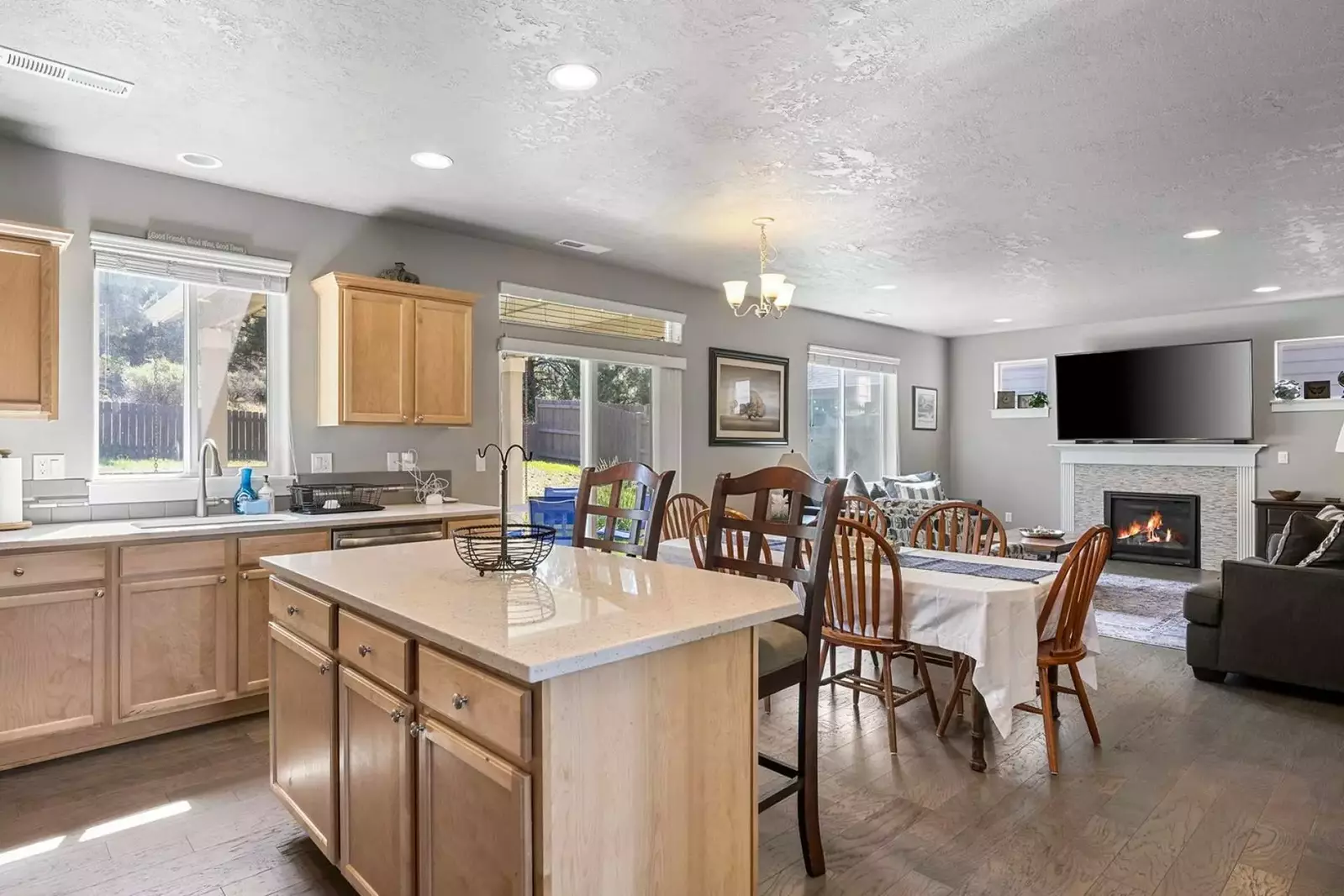 The whole family can hang out in the kitchen/dining room/living room.