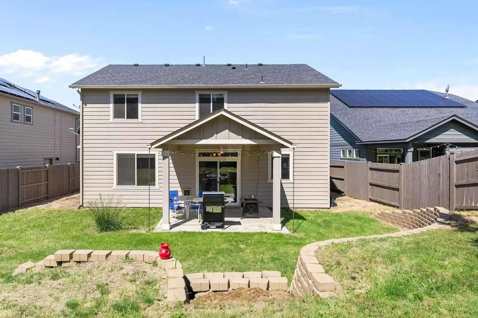 The BBQ and fire table make the yard extra exceptional.