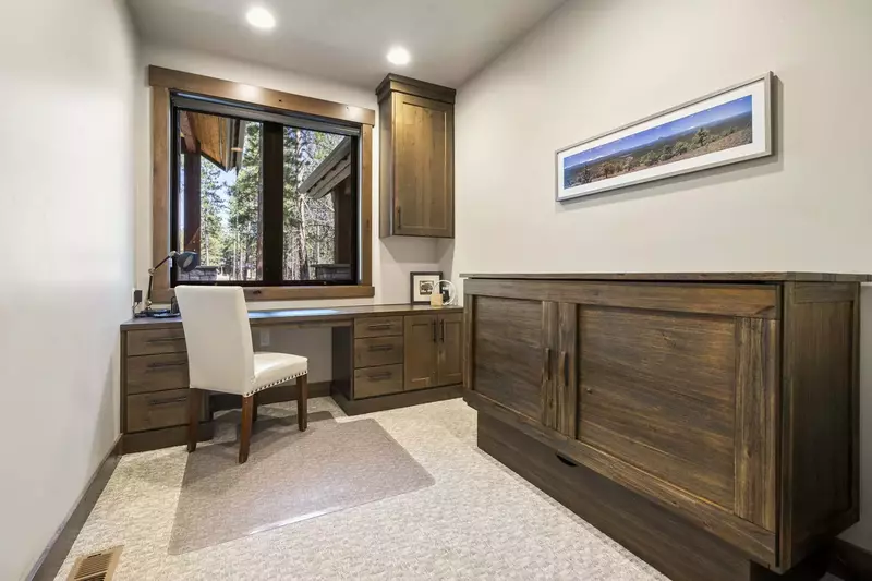 The room with the office set up has a hideaway bed.