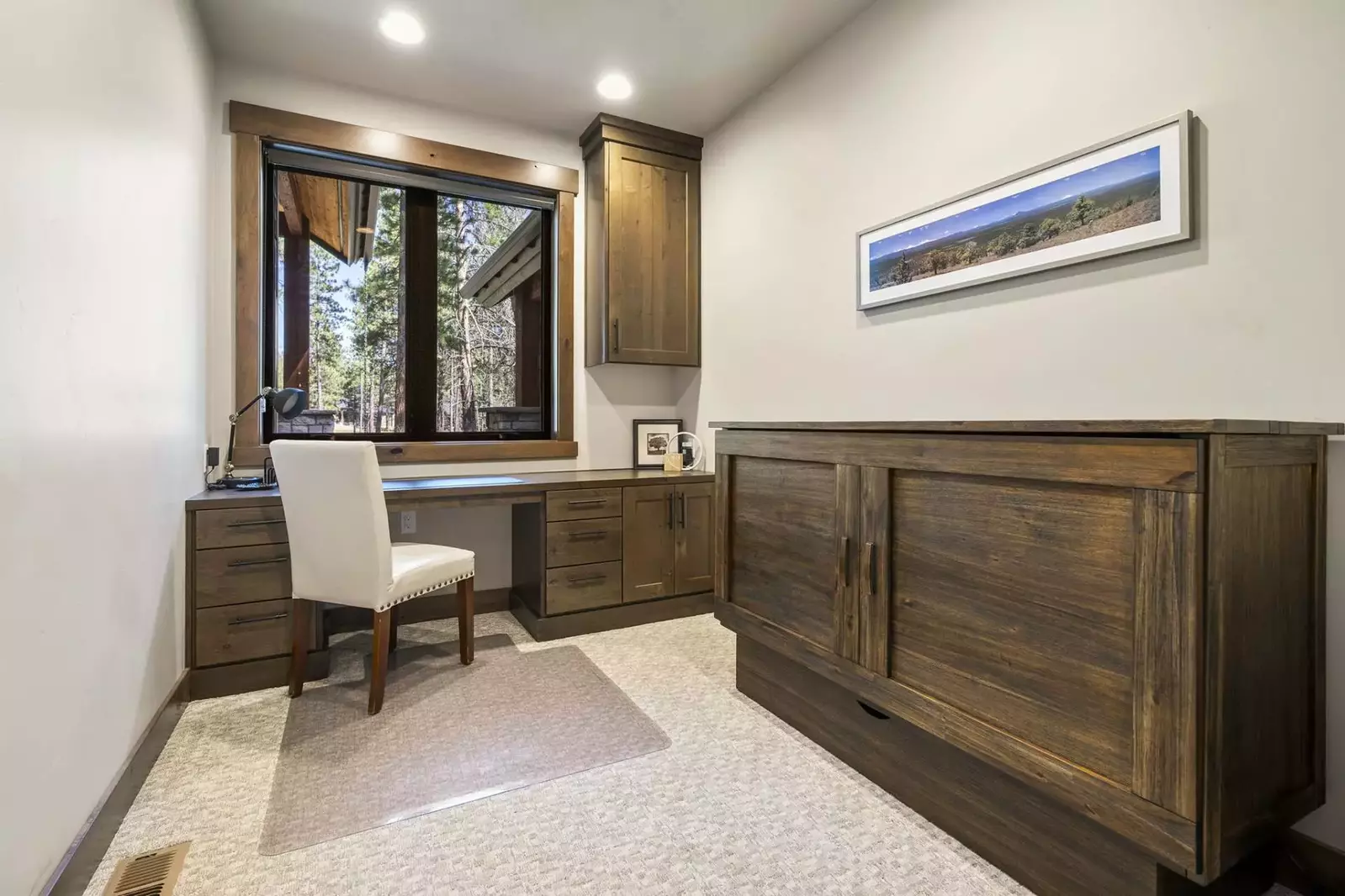 The room with the office set up has a hideaway bed.