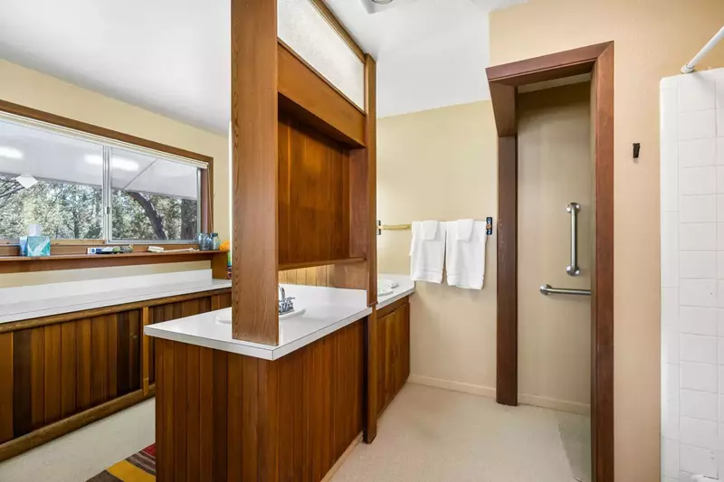 A very spacious bathroom with an elegant design.