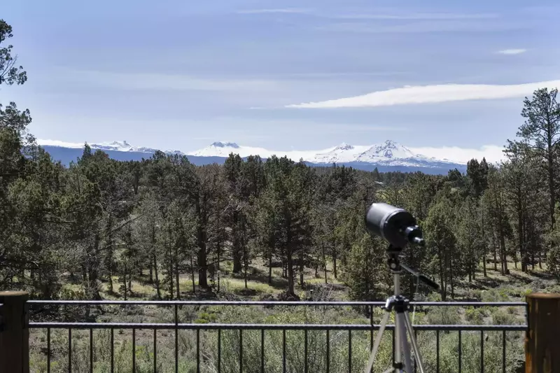 Use the telescope to get a better view of the Three Sisters.
