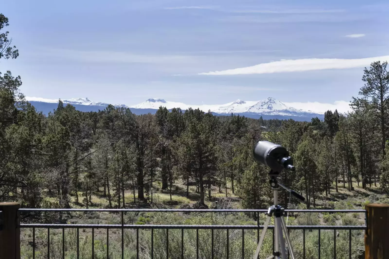 Use the telescope to get a better view of the Three Sisters.