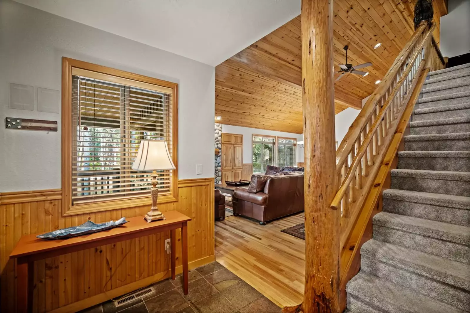 Stunning hand-hewn pine staircase.