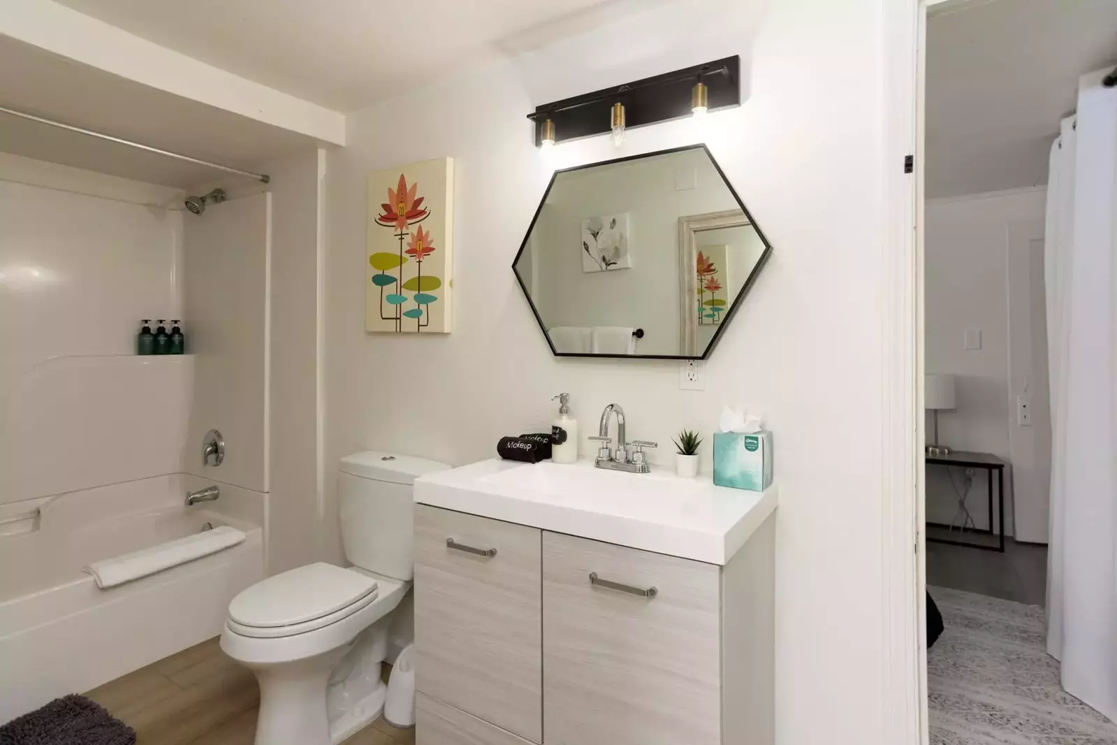 The bathroom is tidy and has a shower with excellent water pressure.