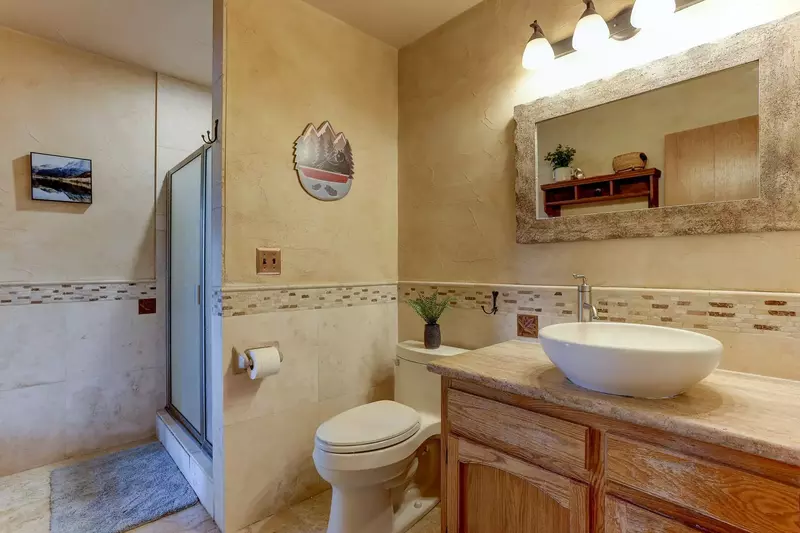 Second full bath with walk-in shower.