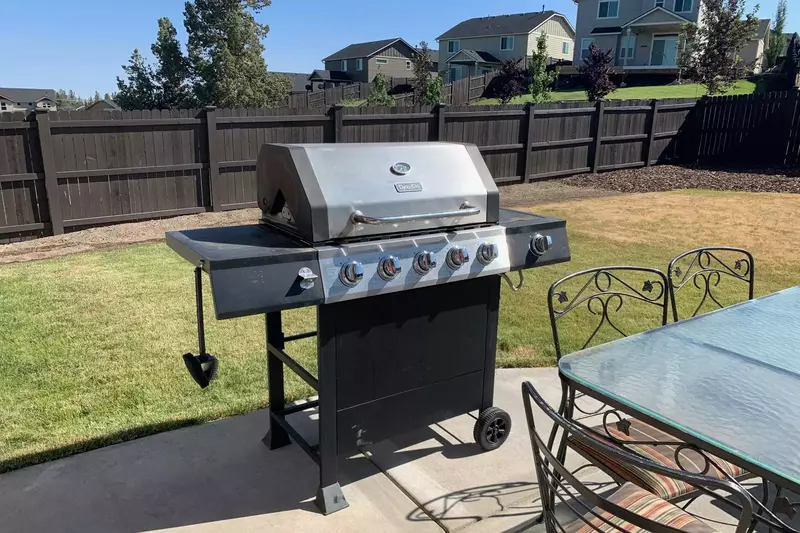 Enjoy the large backyard by grilling your specialty