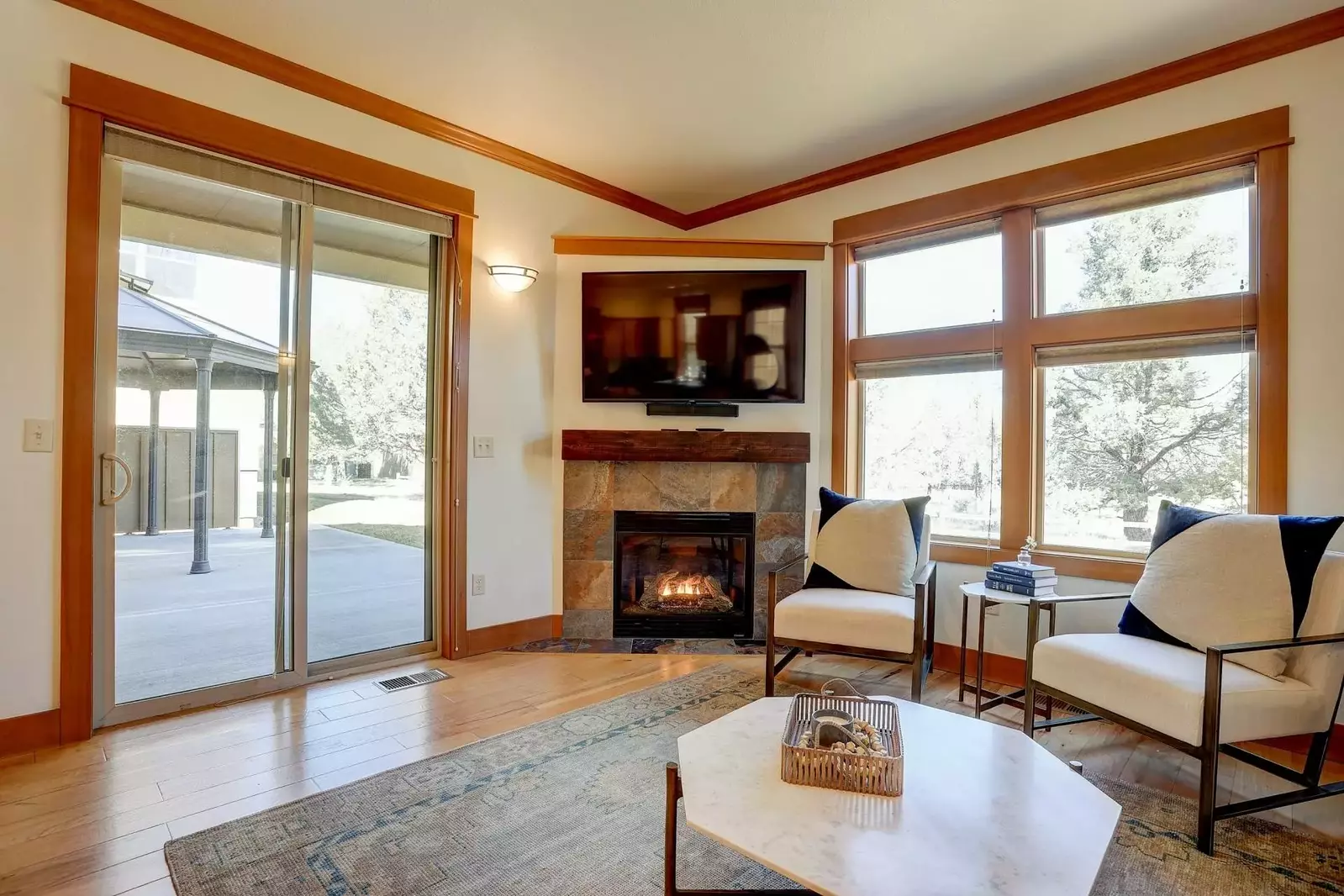 Watch you favorite movies, shows, and sports on this smart tv while relaxing in front of a cozy fire.