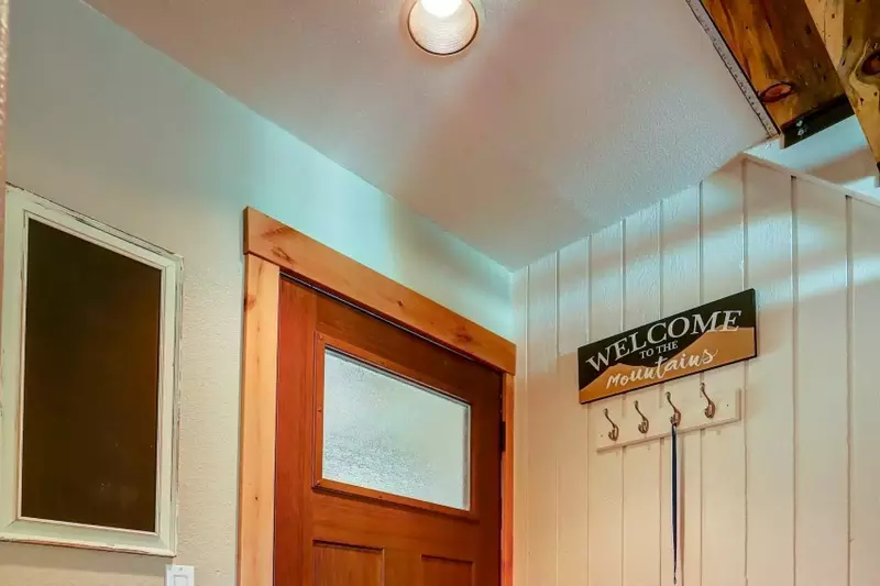 Winter coats, ski pants, swimming pool passes parked here.