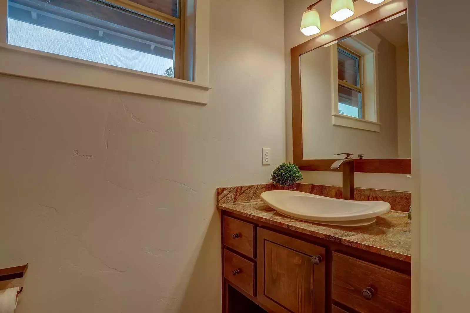 Stylish half bath off Great Room on main level