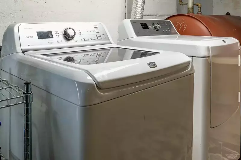 New washer and dryer in lower level