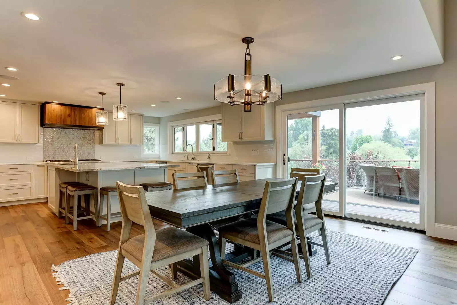 Prepare meals in a fully stocked Chef’s paradise with sweeping views of the river and Columbia Bridge.