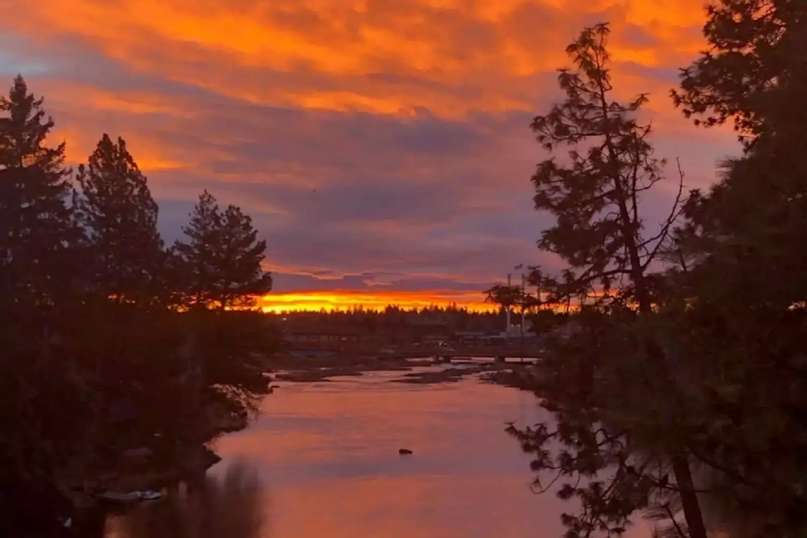 Early morning sun seen over the Old Mill District from upper deck off 2nd level family room.