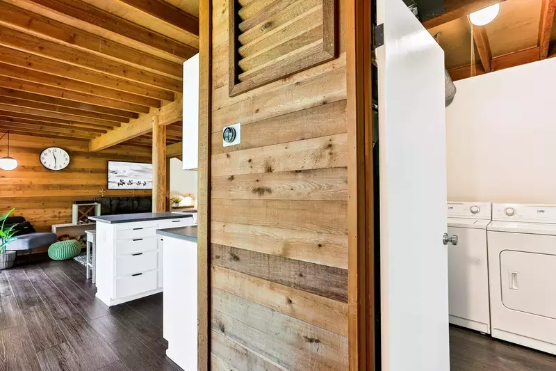 Full size washer and dryer off the kitchen