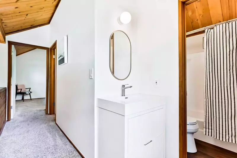 Modern vanity in common space on upper level