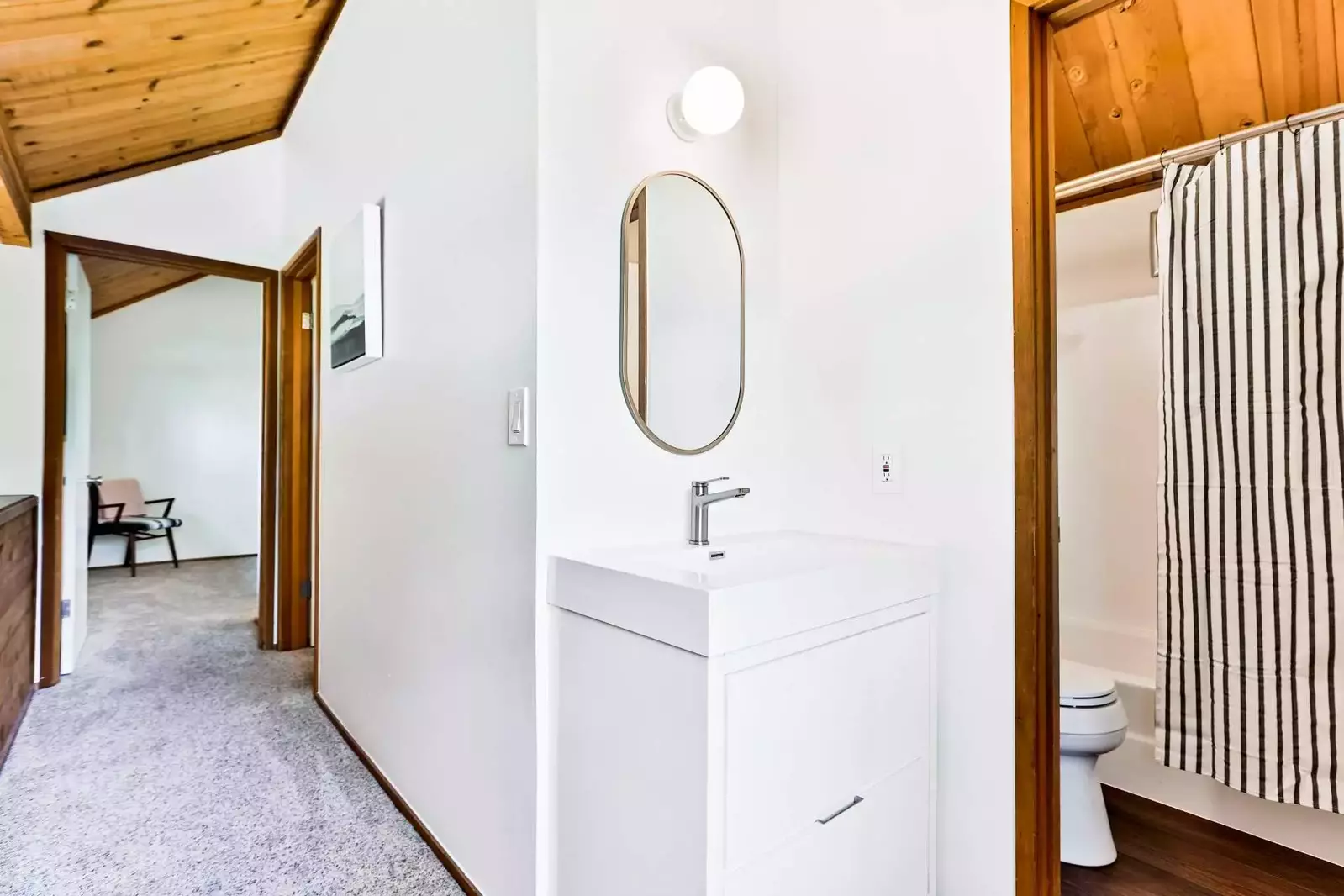 Modern vanity in common space on upper level