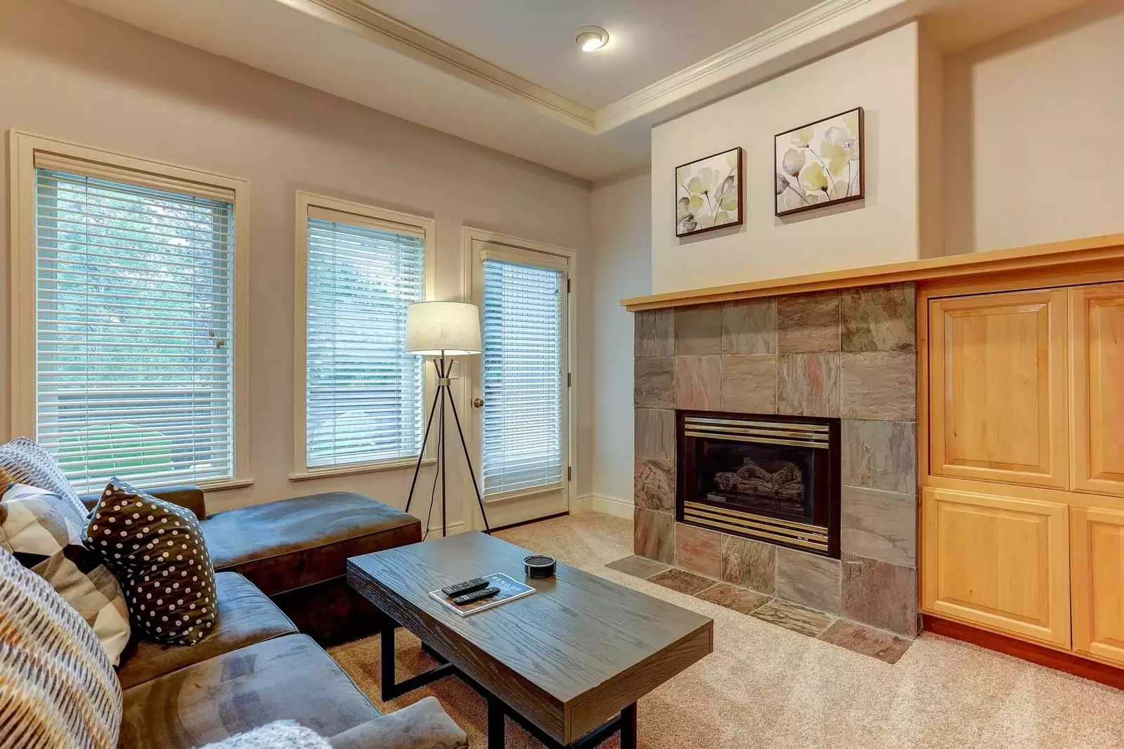 Great living room space to relax in front of the fire, or watch the game.