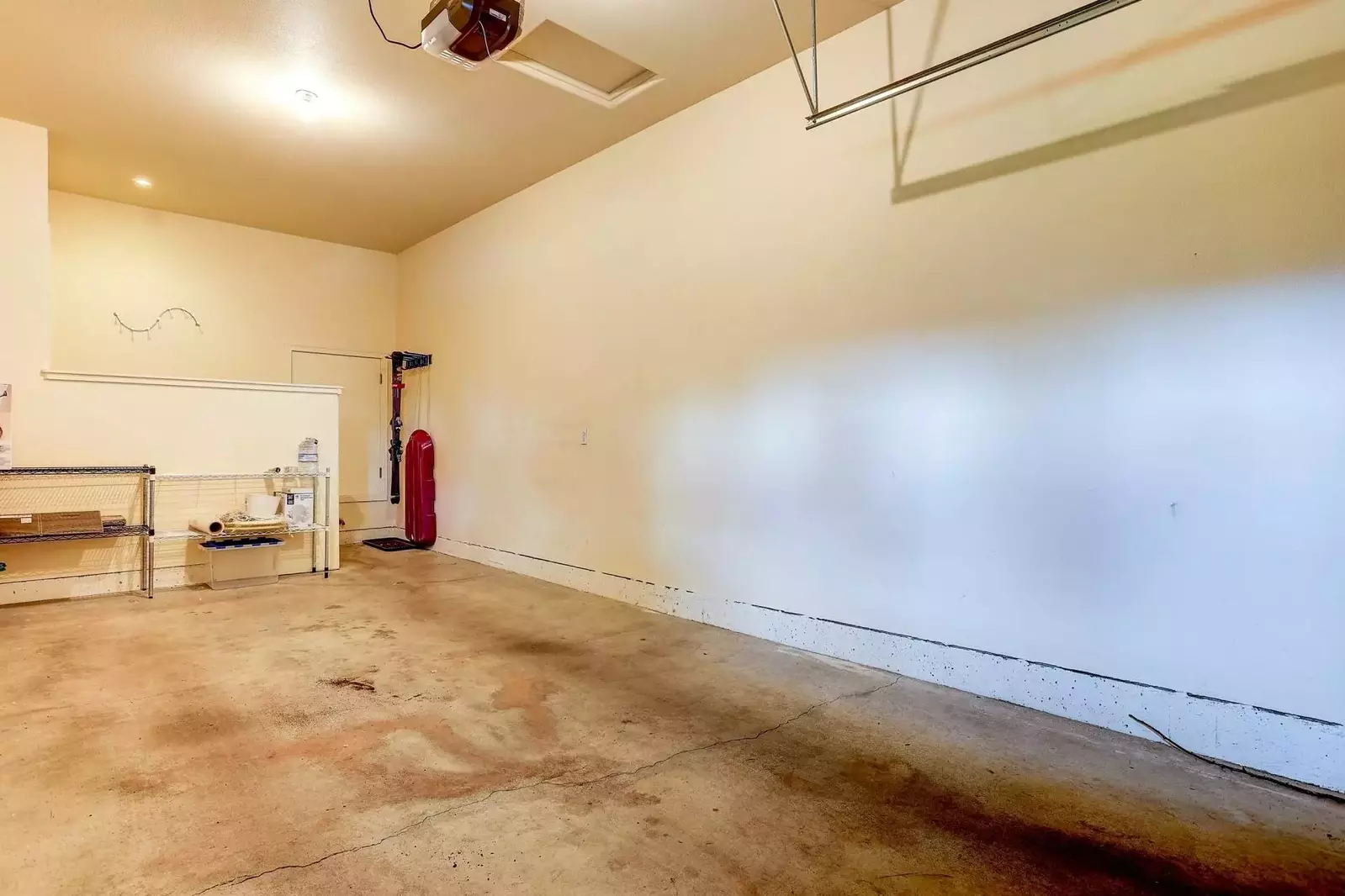 Garage with plenty of room for parking and gear.