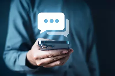 man responding to messages