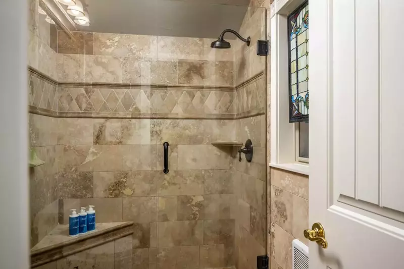 This shower is large, up to date, and has excellent water pressure.