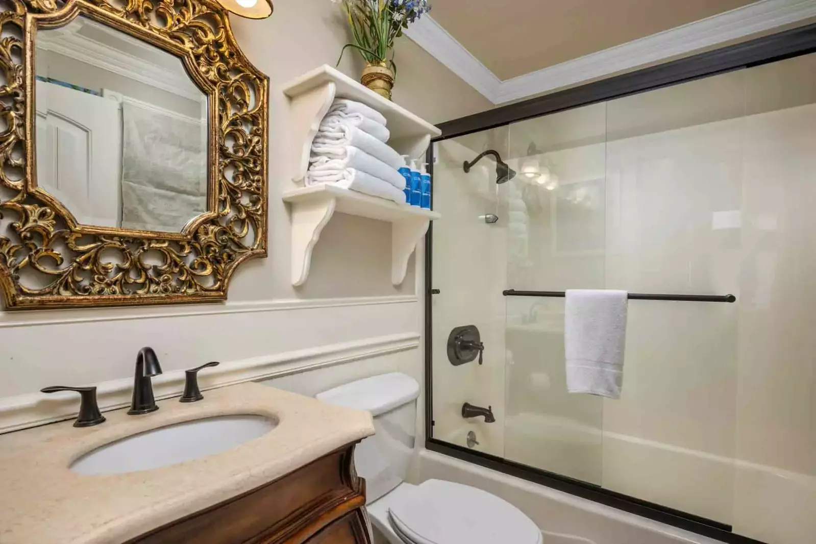 Another bathroom featuring a shower with robust water pressure.