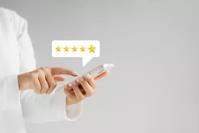 guest leaving 5 star review on phone