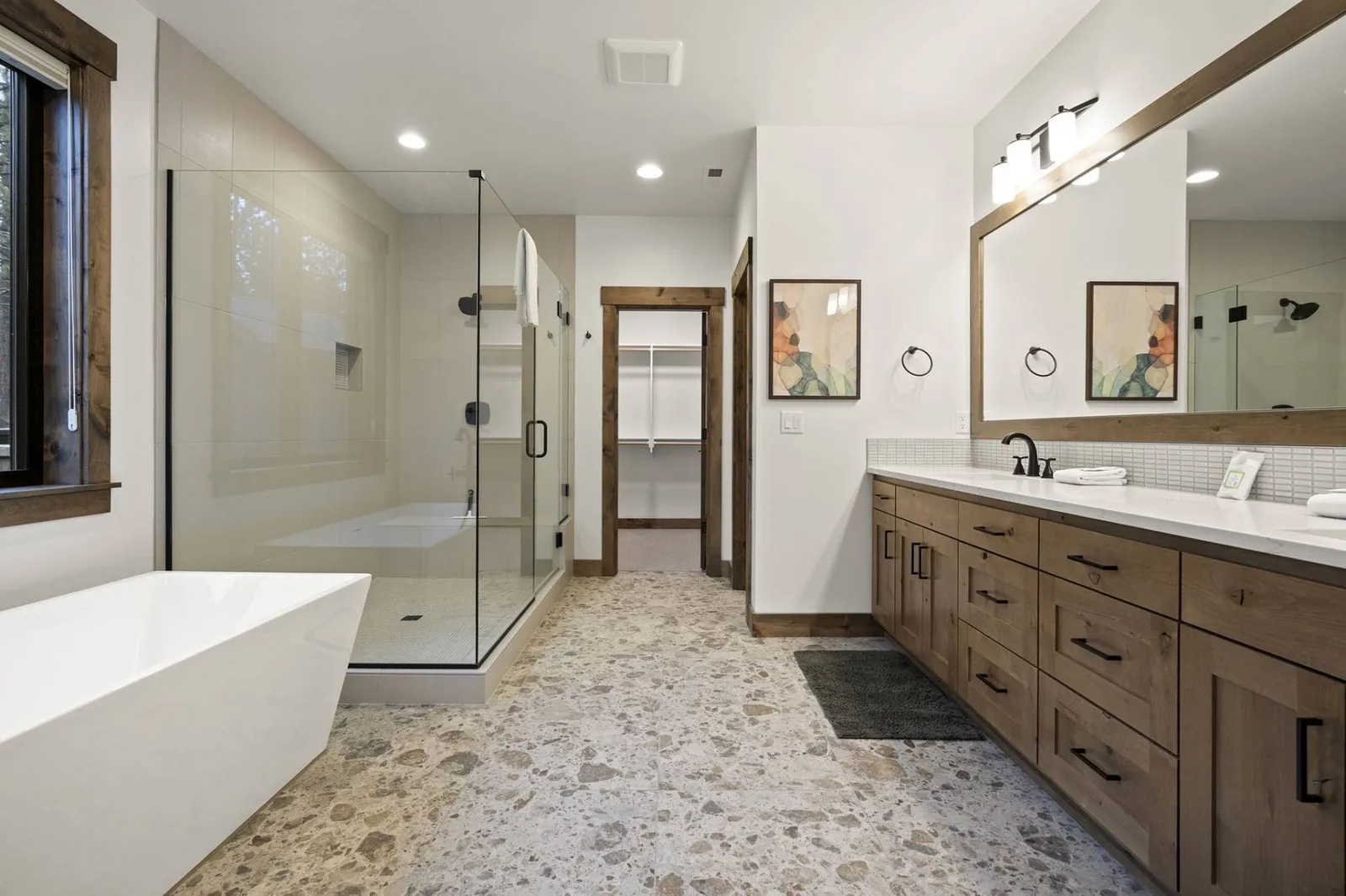 This bathroom is massive with luxurious amenities!