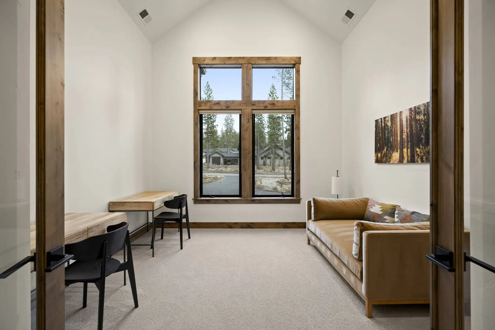 This area can serve as a home office. Imagine getting to work in beautiful Sunriver!
