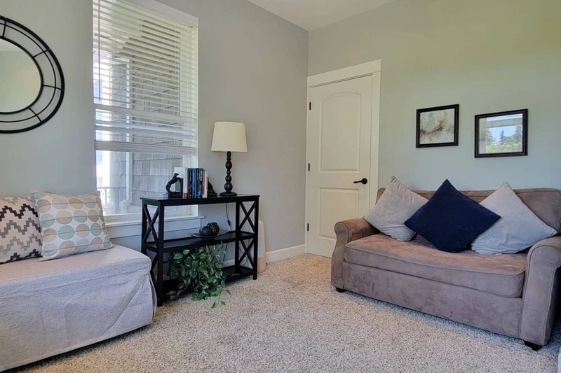 Pull out bed ottoman in office room