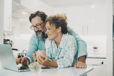 couple browsing rental homes