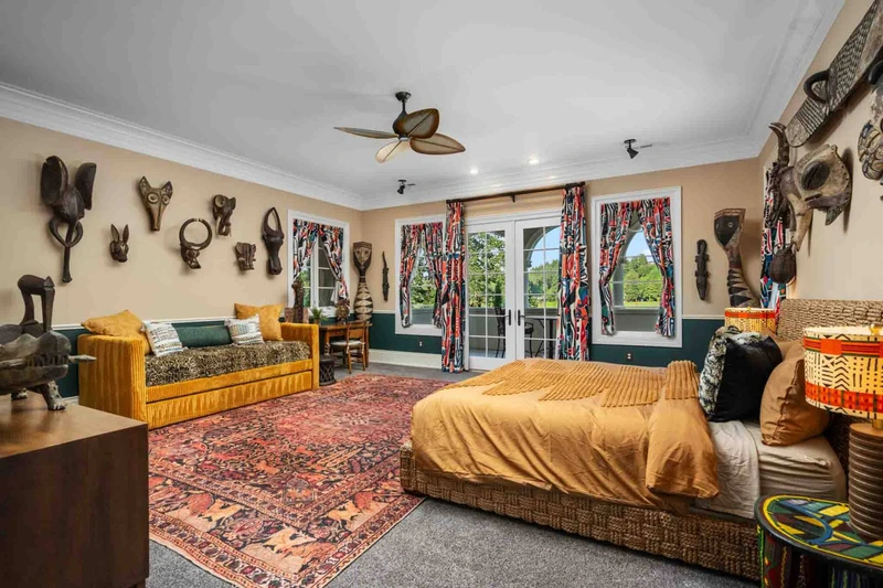 The Serengeti Suite, experience the majesty of authentic carved art from across Africa enjoying the Willamette River view from the private balcony.