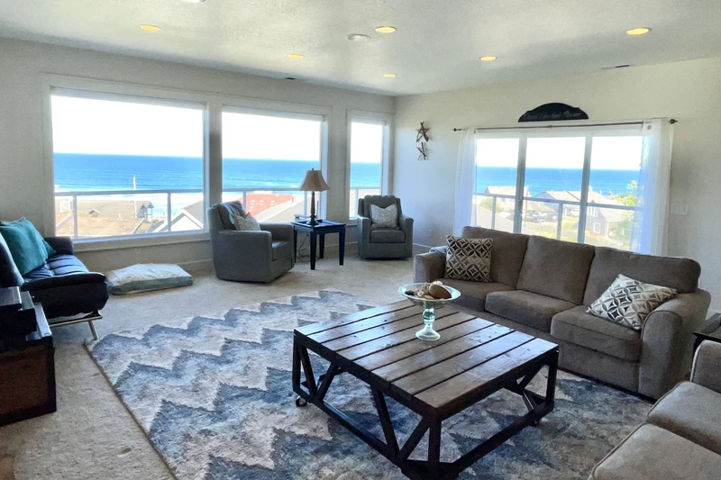 Enjoy ocean views while relaxing in the living room.
